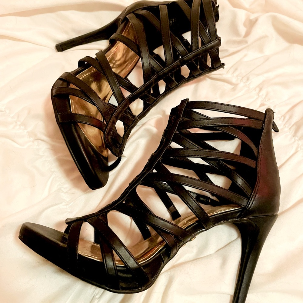 Jennifer Lopez black gladiator stilettos